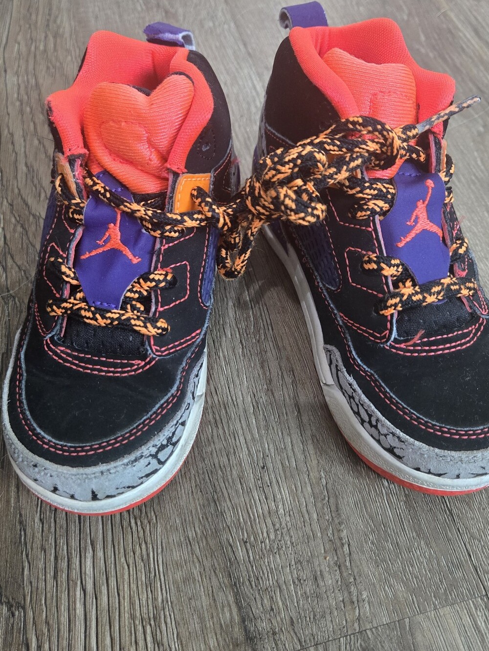 Jordan Kids Black Sneakers with Orange and Purple Accents